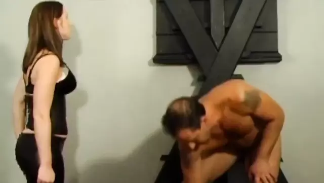 Man licks Mistress' feet in latex